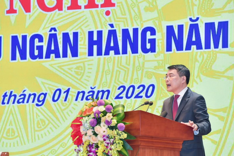 SBV Governor Le Minh Hung delivers his opening speech at the conference