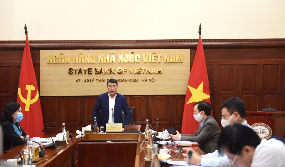 Tại điểm cầu NHNN, Thống đốc Lê Minh Hưng báo cáo Chính phủ tình hình hoạt động của ngành Ngân hàng