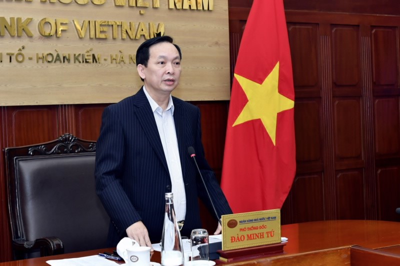 SBV Deputy Governor Dao Minh Tu speaks at the meeting