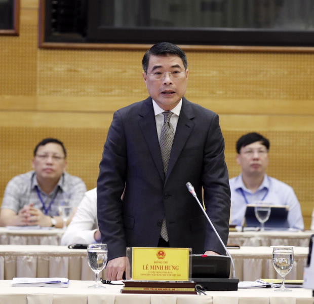 Governor Le Minh Hung speaks at the Meeting (source: VNA)